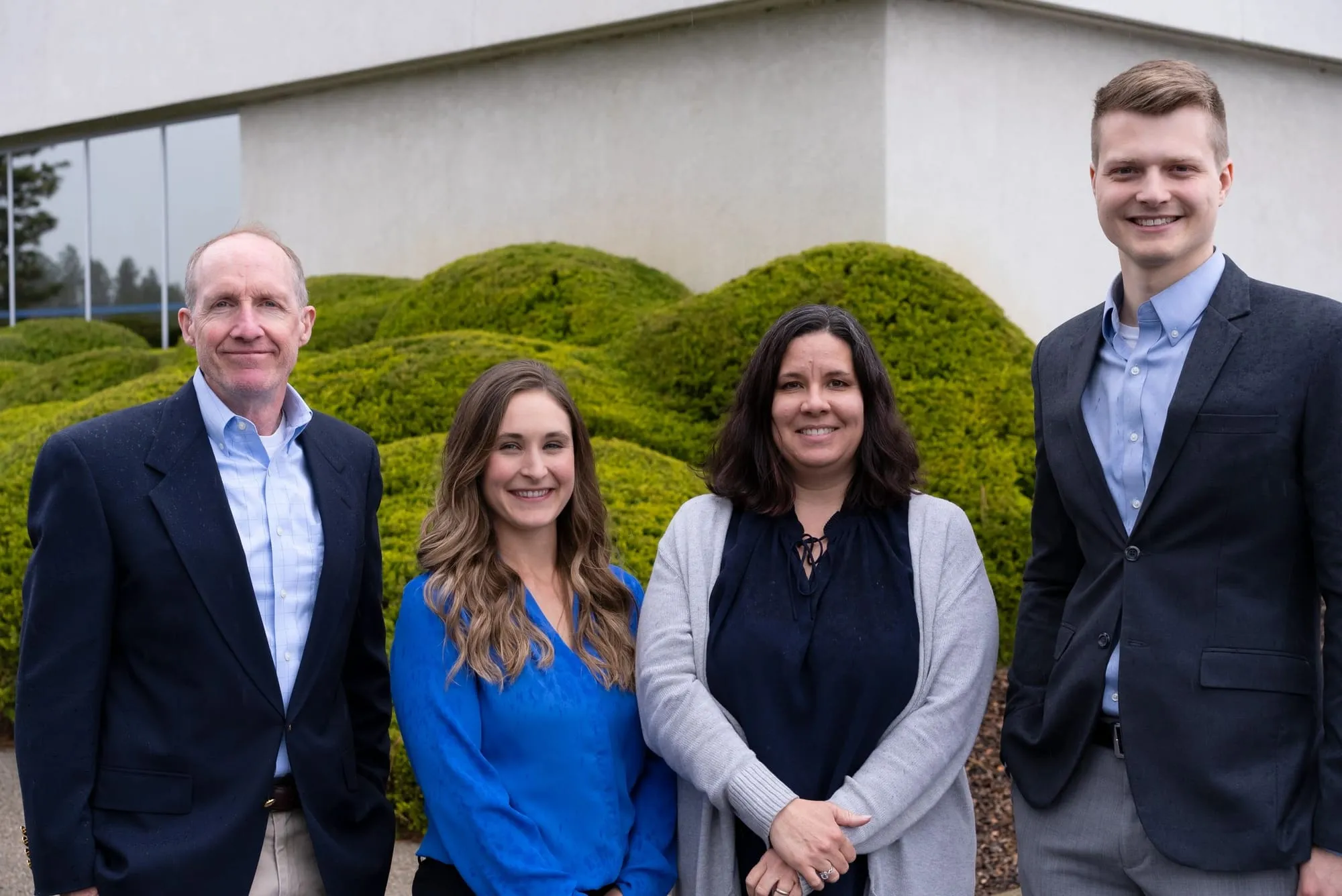 The Stewardship Concepts team posed outside their Spokane office